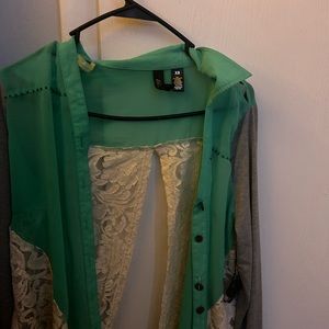 Green and lace shirt size xs super cute and mature never worn